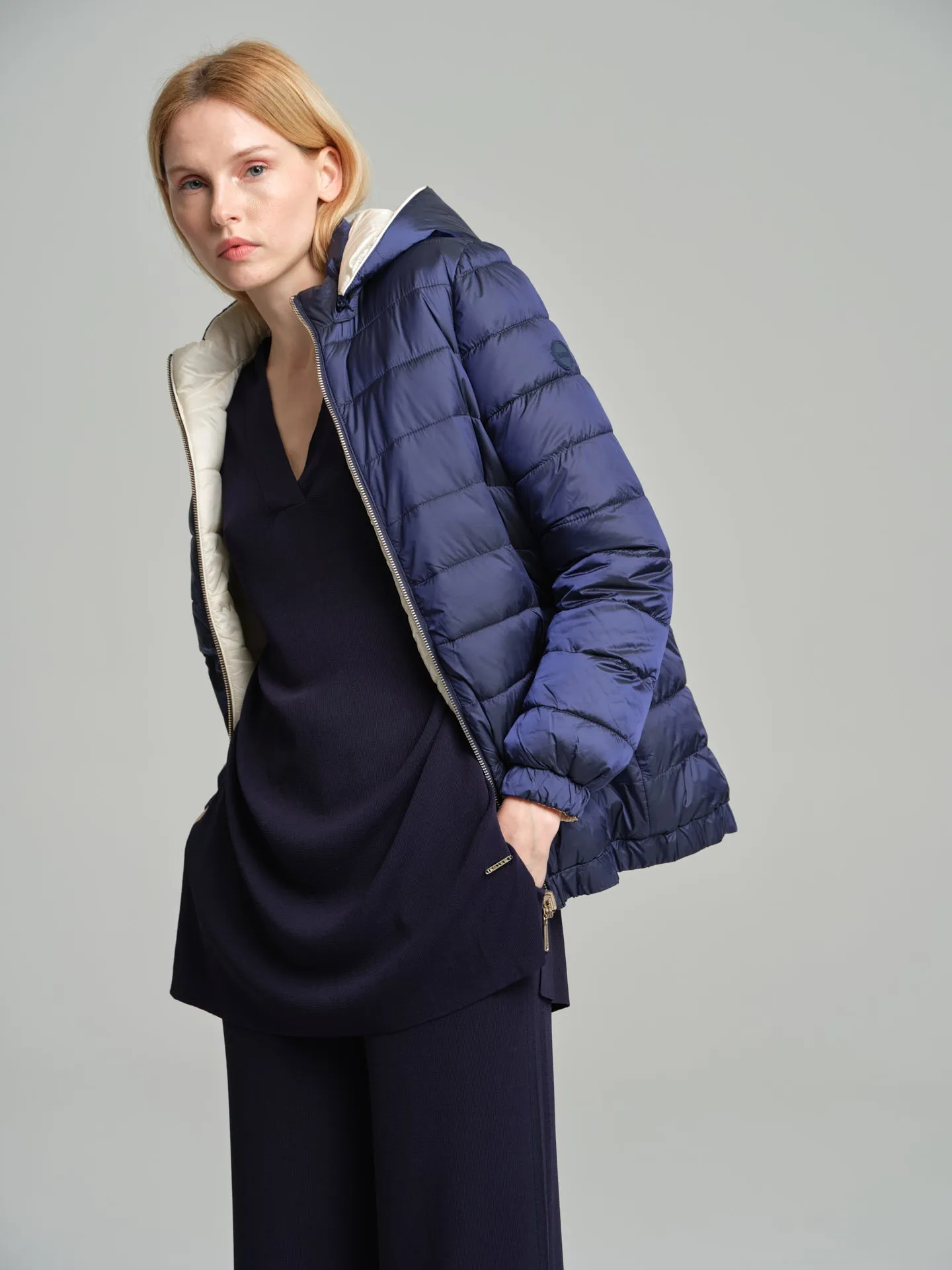 Reversible puffer with recycled bottles filling