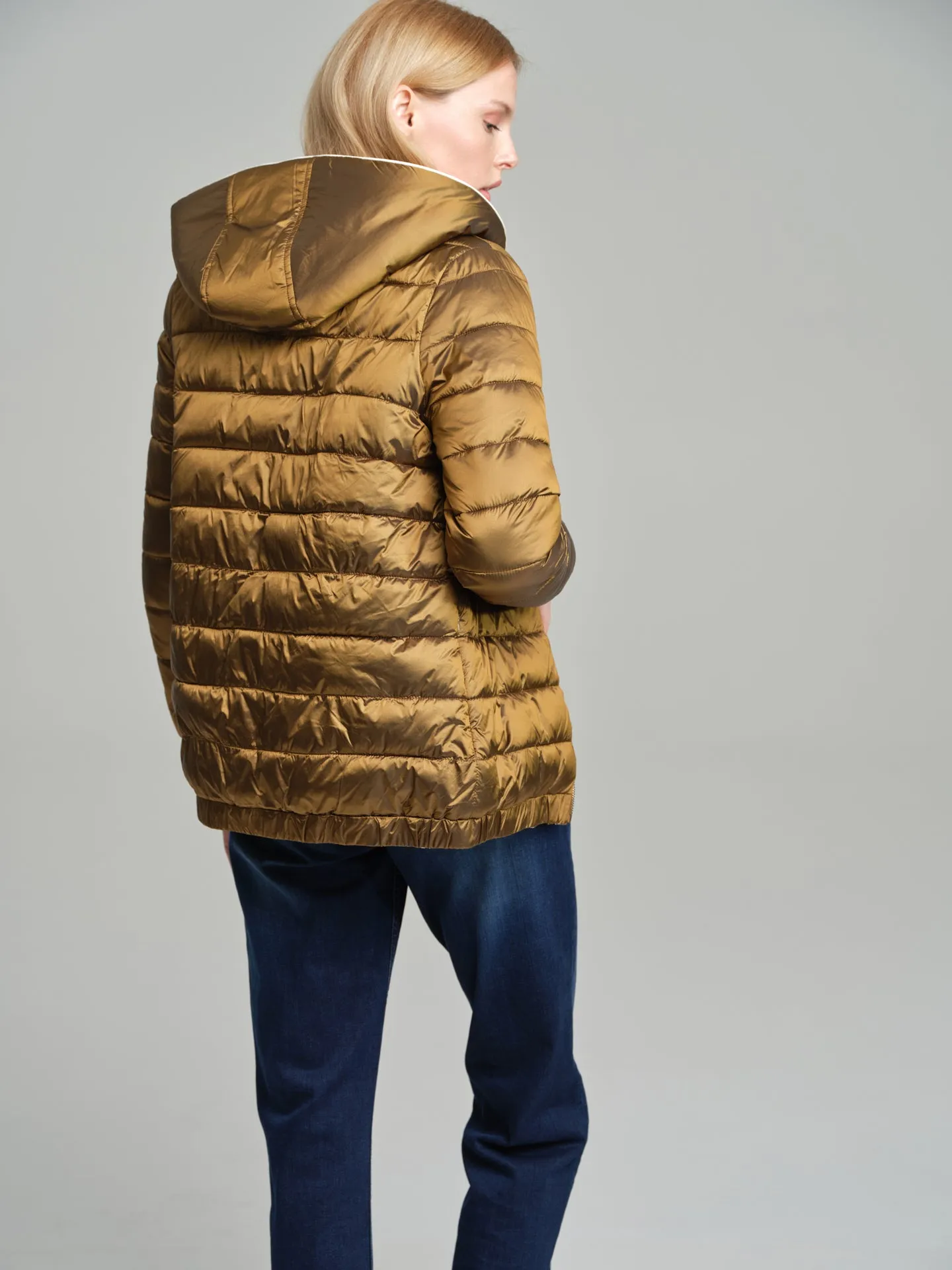 Reversible puffer with recycled bottles filling